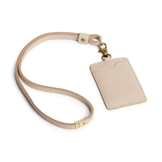 Pebbled Bone | A leather lanyard attached to a matching card holder on a white background