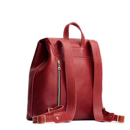 Chili Red | Leather backpack with magnetic flap closure on a white background
