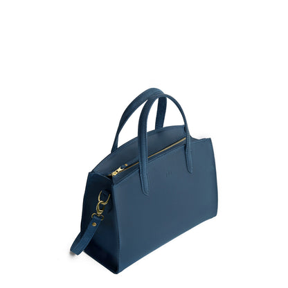 Deep Water*Medium | Leather tote bag with handles, adjustable crossbody strap, zipper top, and two back pockets