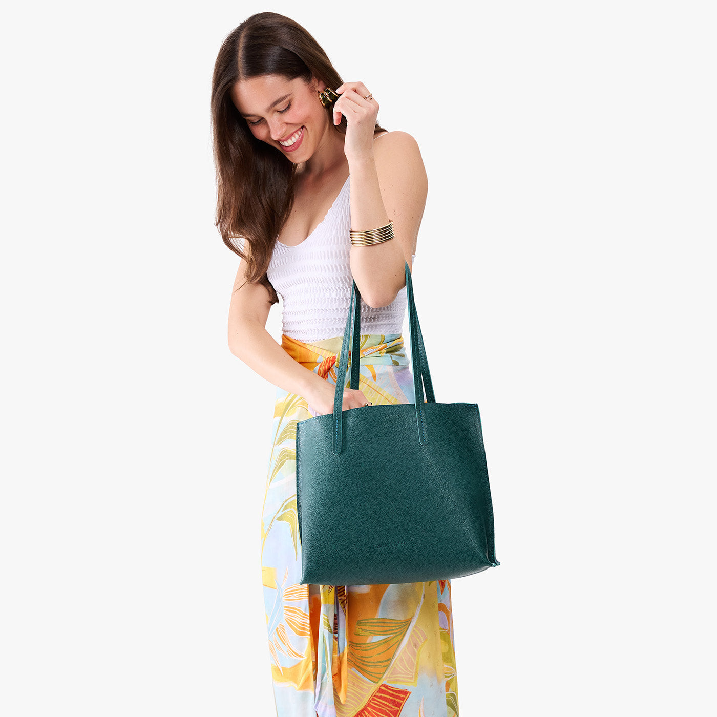 Sea Glass*Medium | Model carrying leather tote bag with matching leather handles