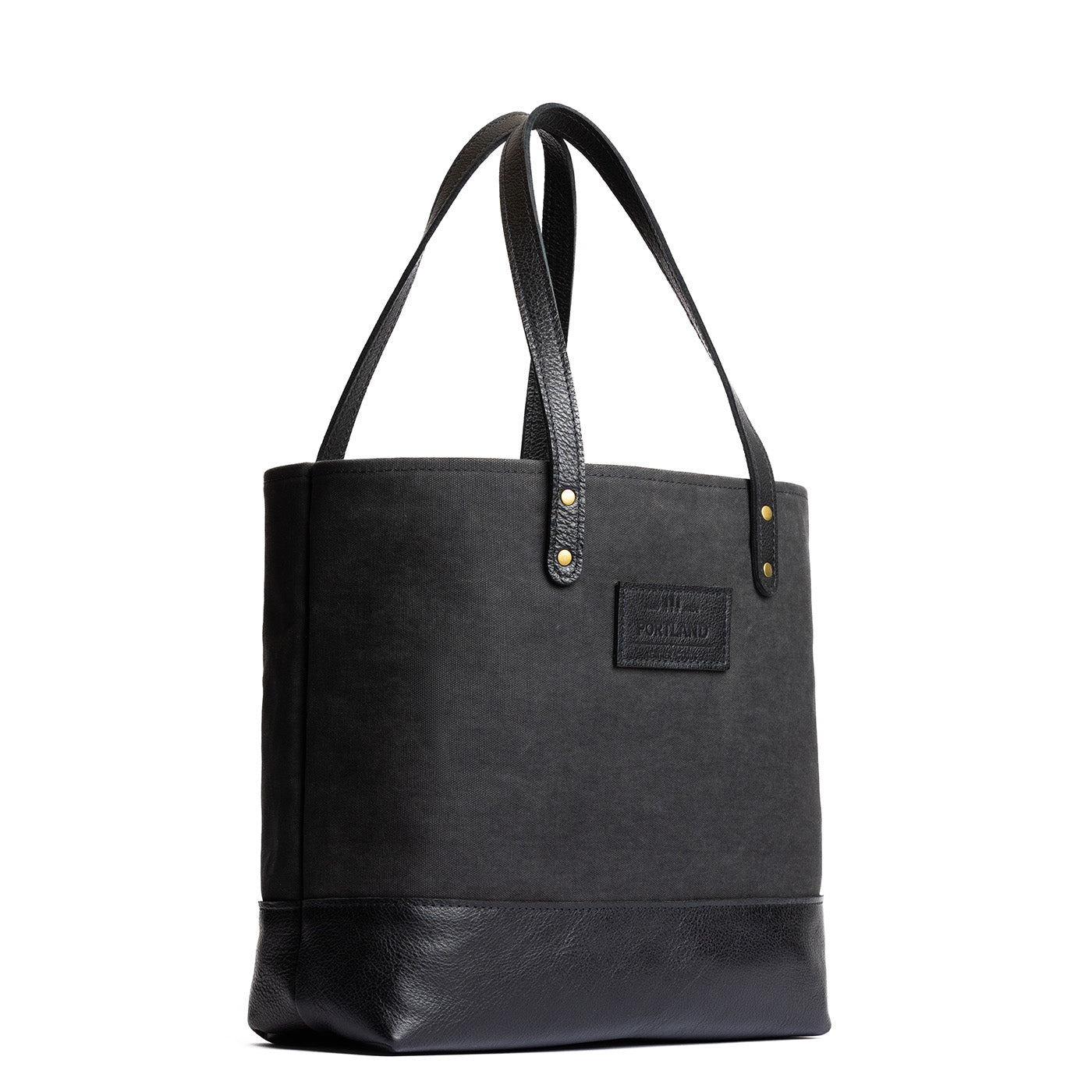 Black | Canvas tote with leather base and handles