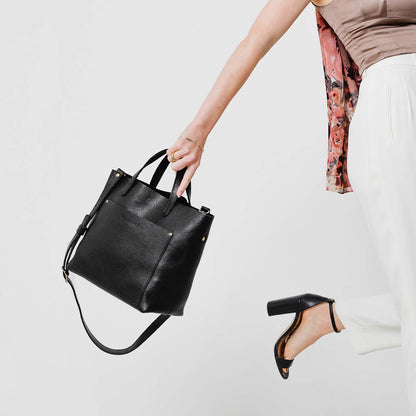 Pebbled--black | Midsize crossbody tote with handles and a pocket
