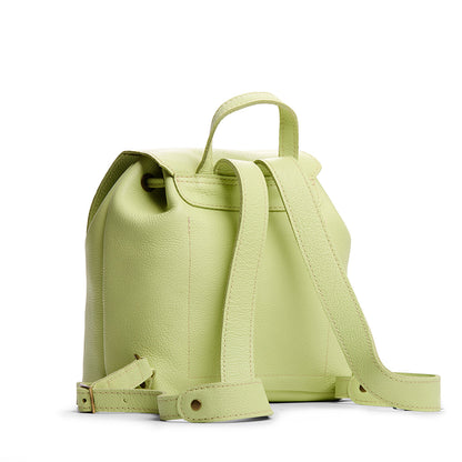 Shadow Lime | Back of drawstring bucket backpack with snap closure under flap