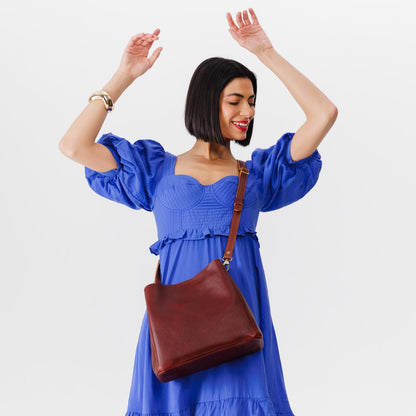 Cinnamon Bear | symmetrical bucket bag with latch closure and removable crossbody strap