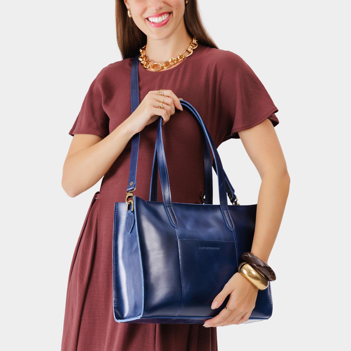 Cowboy Blue*East/West | Structured wide tote bag with overlapping panels and crossbody strap