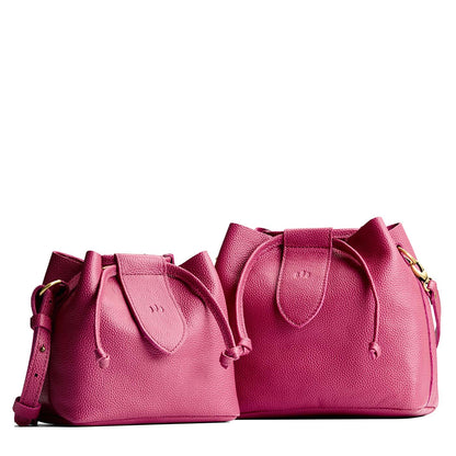 Wild Rose | Small and large symmetrical leather bags with leather drawstring closure and adjustable shoulder strap