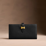 Onyx*Large | Leather bifold wallet with a strap and bar closure