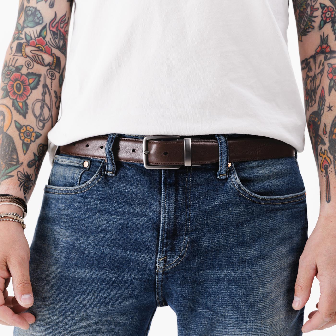 All Variants | A person wearing the Italian Reversable Leather Belt on the brown side