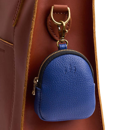 Molino Blue | Leather keychain pouch with zipper top, swivel lobster clasp, and debossed emblem of three PLG trees