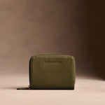 Bay Green | Wallet with card and storage pockets on a light brown background
