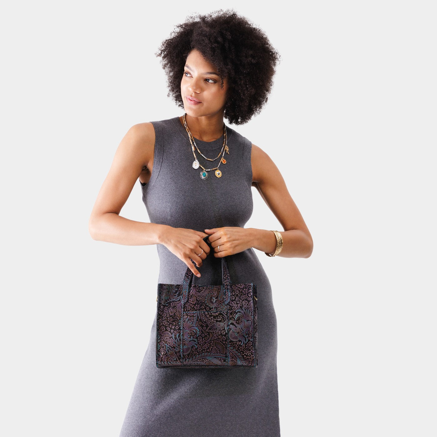 Masquerade | Structured mid-size tote bag with overlapping panels and crossbody strap