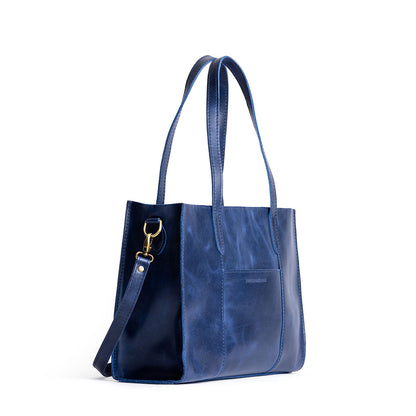 Cowboy Blue*East/West | Structured wide tote bag with overlapping panels and crossbody strap