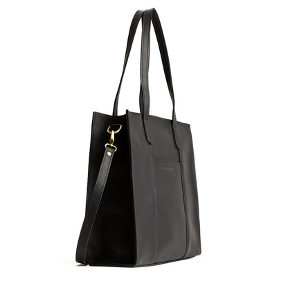 Black*North/South | Structured large tote bag with overlapping panels and crossbody strap