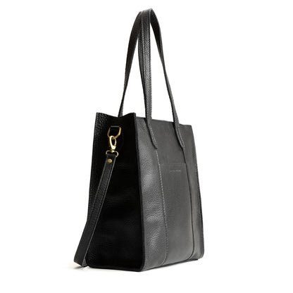 Pebbled--black*North/South | Structured large tote bag with overlapping panels and crossbody strap