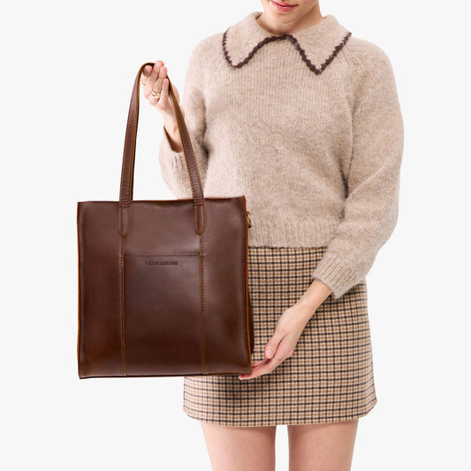 Cognac*North/South | Structured large tote bag with overlapping panels and crossbody strap