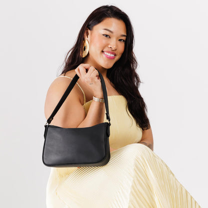 Black*Small | Petite bean shaped shoulder bag with a zipper closure