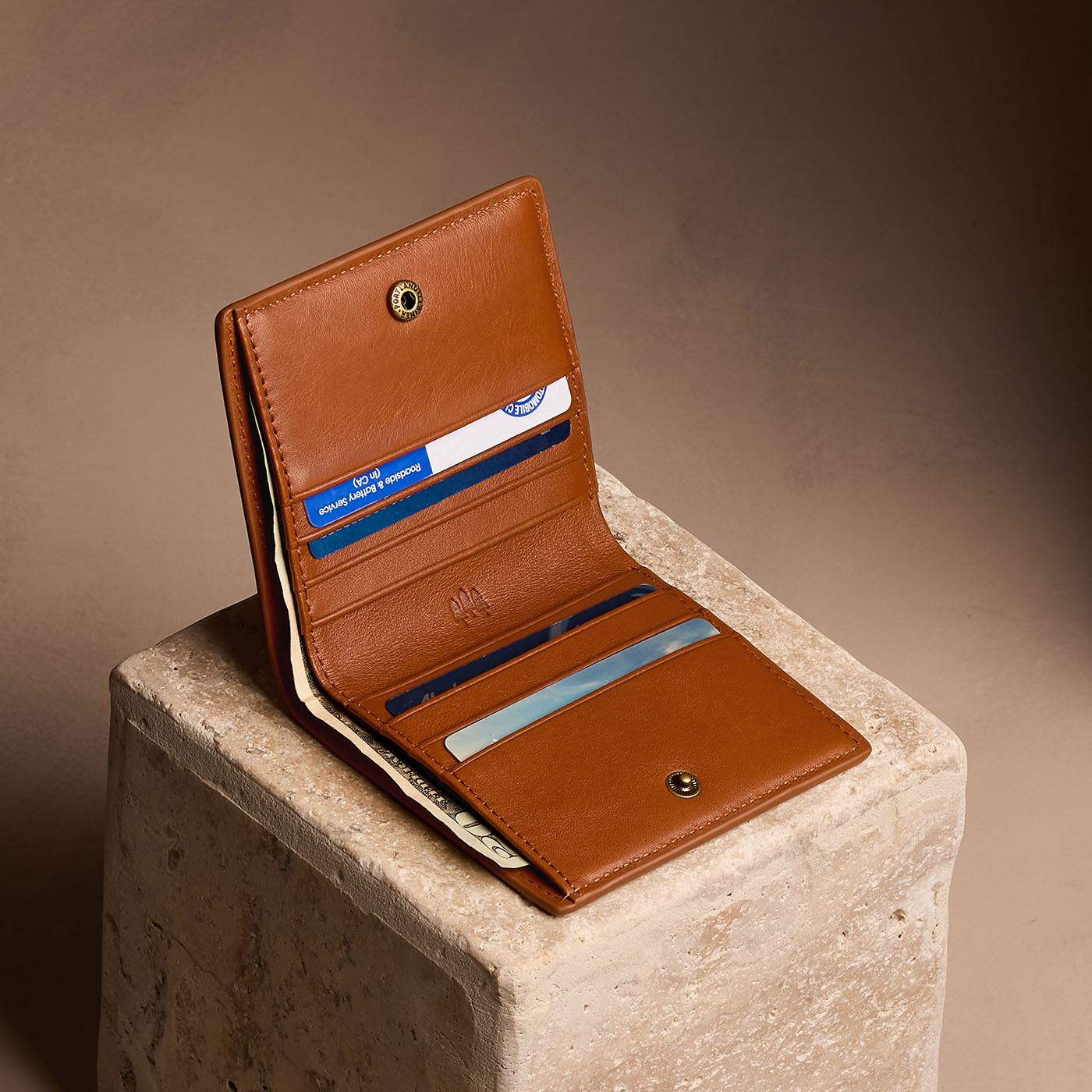 Vintage Tan*Small | Petite slim leather bifold wallet with multiple card slots and a zippered back pocket