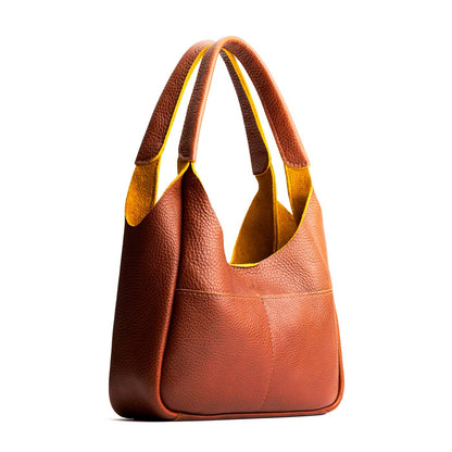 Sienna*Medium | U-shaped, flat-bottomed leather shoulder bag with two outside pockets