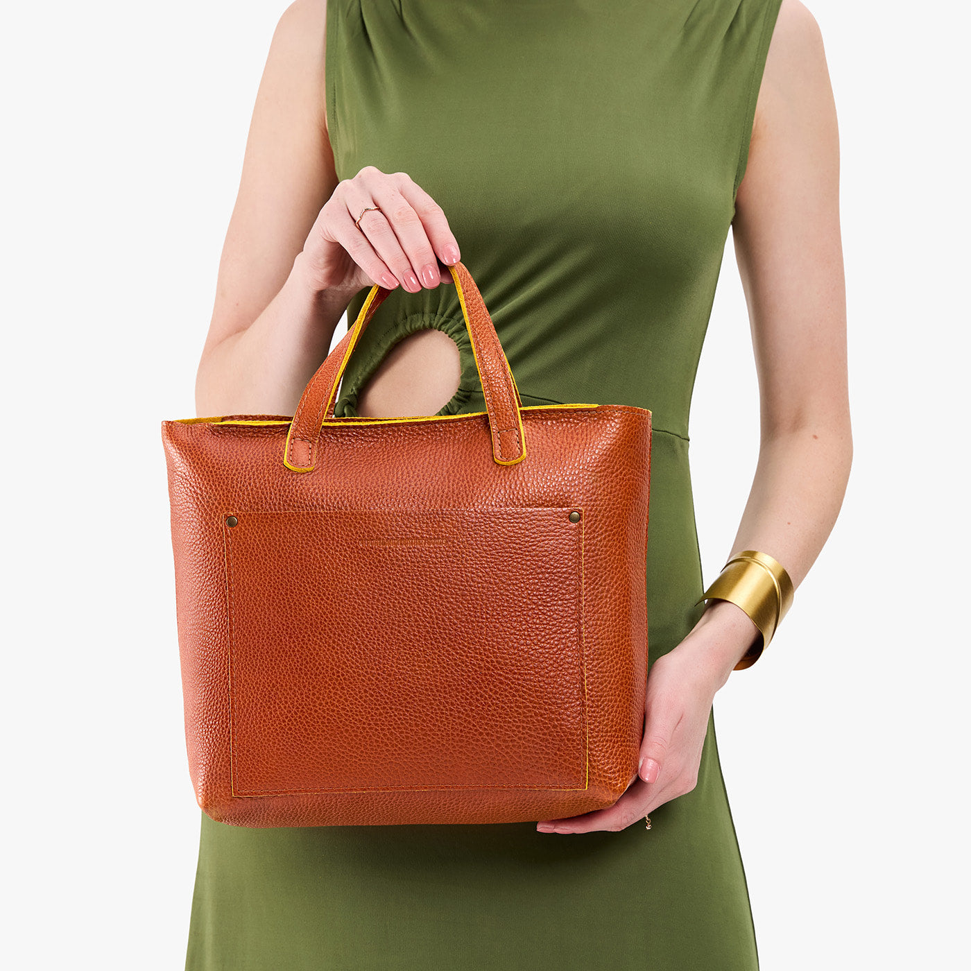 Sienna*Zipper | Model holding midsize crossbody tote with handles and a pocket