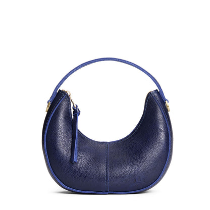 Cobalt | Crescent shaped shoulder bag with zipper closure and gold accents