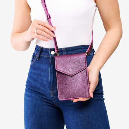 Ultra Violet | Model wearing slim, phone-shaped crossbody purse with magnetic closure