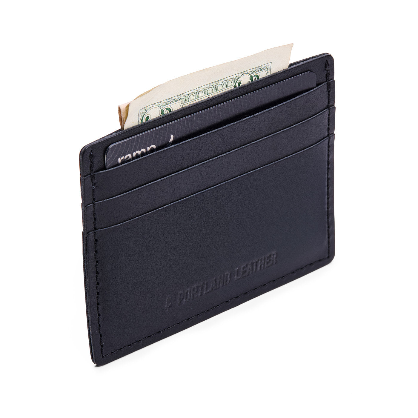 Slim wallet with three card slots and a top slot