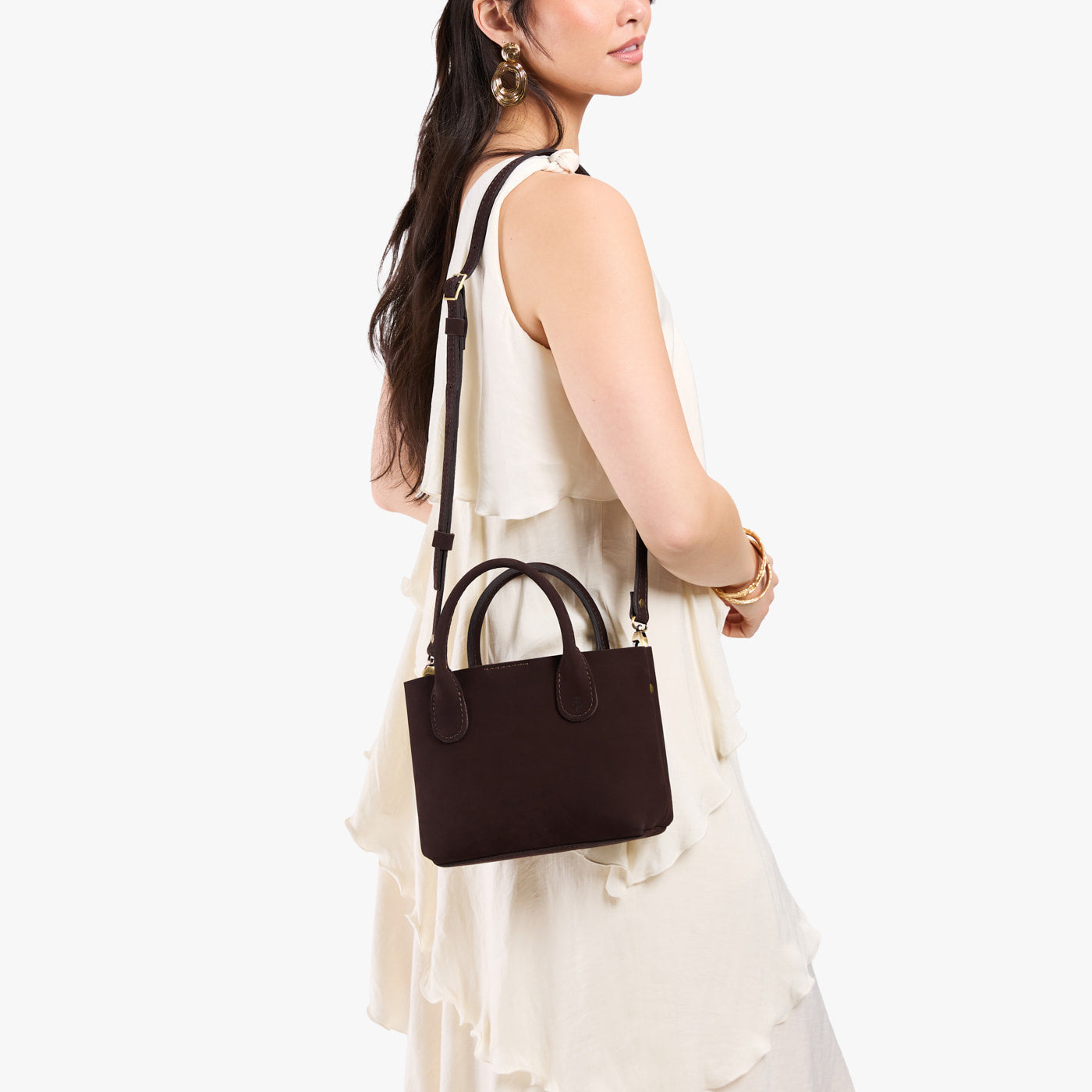 Velvet Brown*Small | Model wearing petite tote purse with structured leather handles and crossbody strap