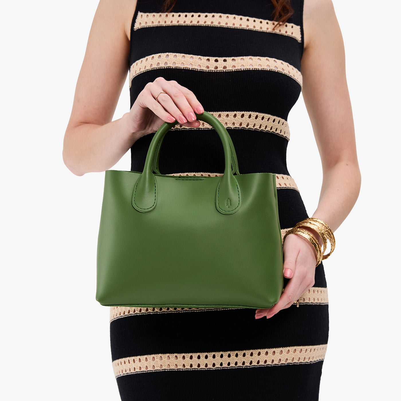Cactus*Large*Zipper | Model wearing a mid-size tote purse with structured leather handles and crossbody strap