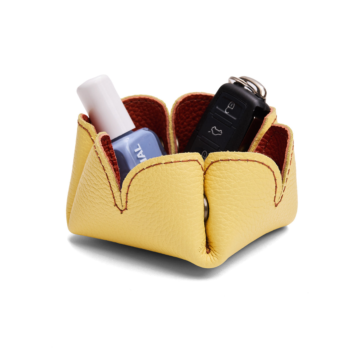 Koi | Desert bell-shaped foldable leather tray with snap-button corners holding items