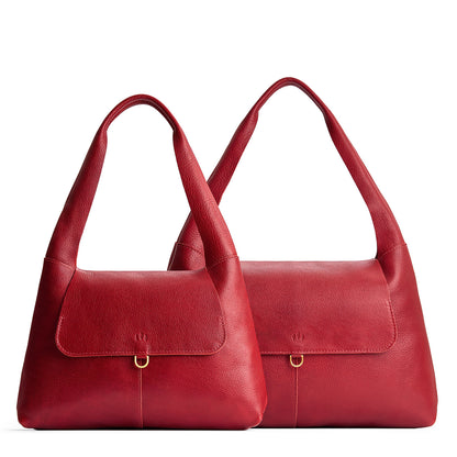 Chili Red | Comparison image of a slouchy triangle shaped shoulder bag with a flap