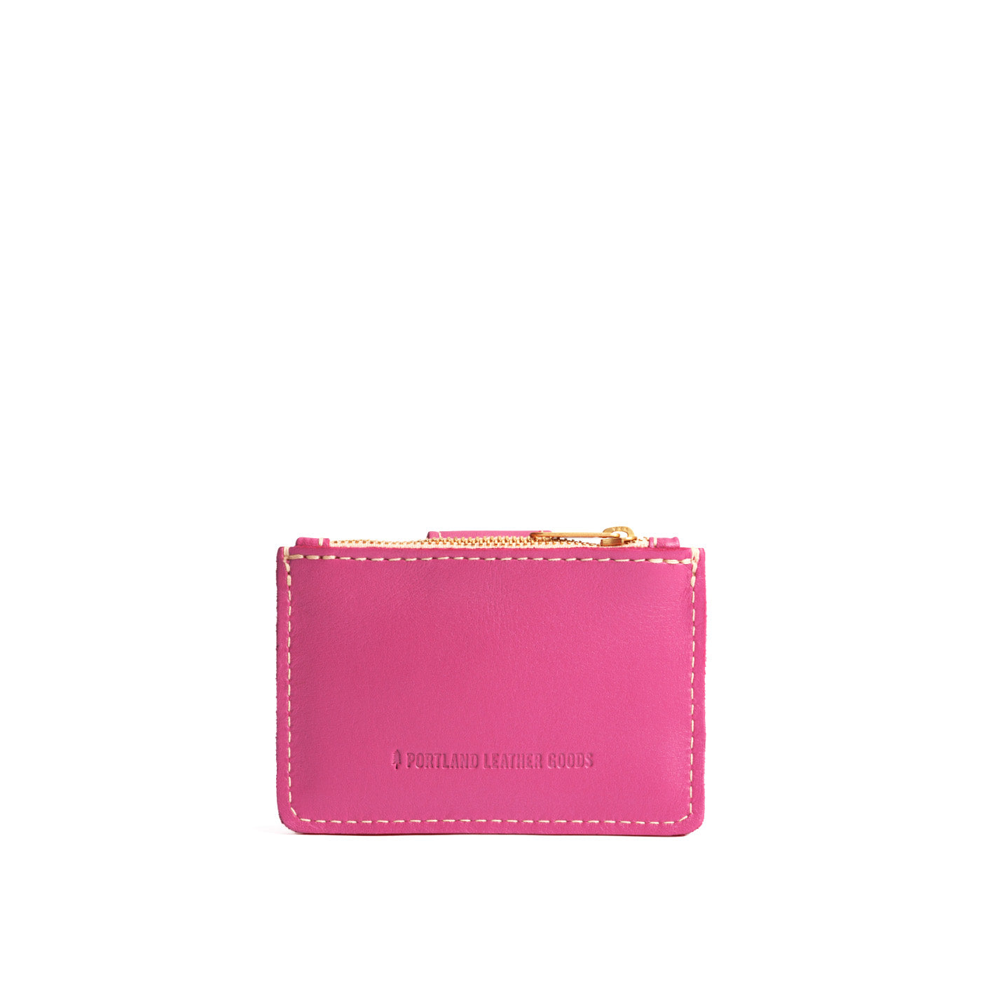 Lip Gloss | Back of compact wallet with snap closure and zippered pouch