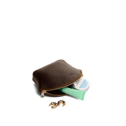 Coldbrew*Small | Seashell shaped leather makeup bag with curved top zipper and flat bottom