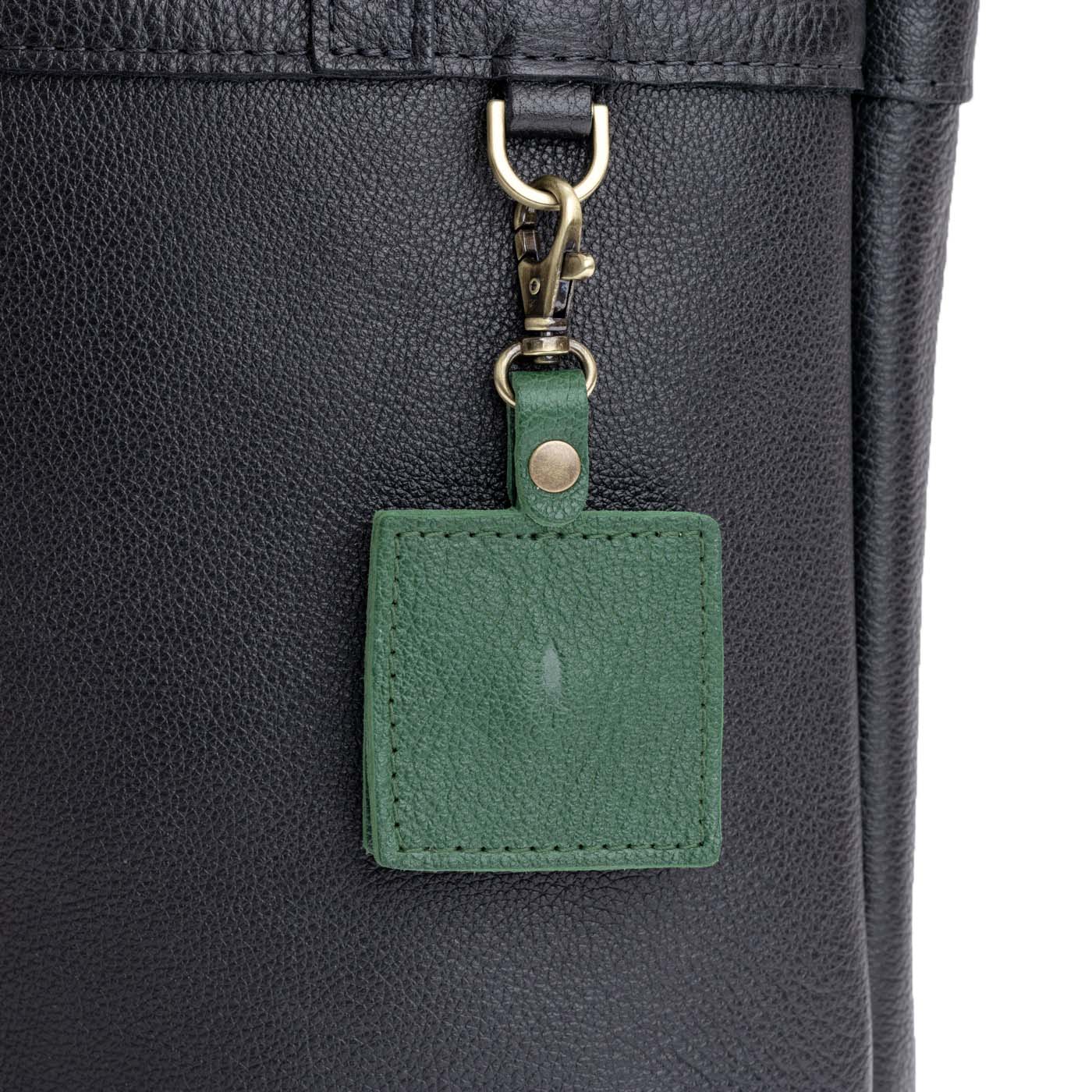 Bacalar | Square-shaped leather AirTag holder with snap closure and swivel lobster claw clasp