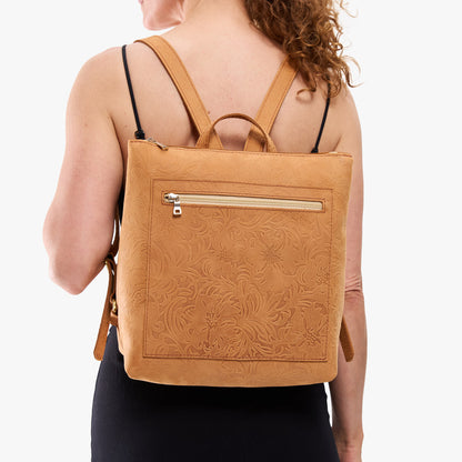 Desert Flower | Model wearing square slim leather tote backpack