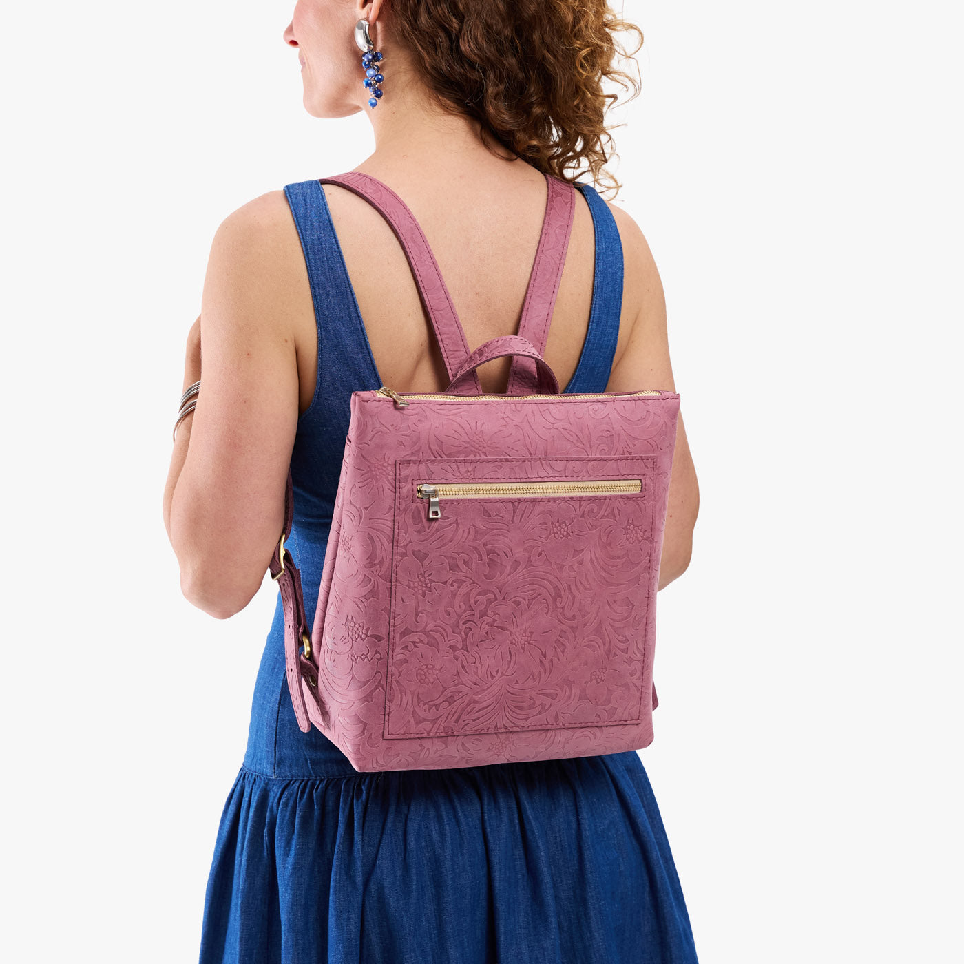 Hollyhock | Model wearing square slim leather tote backpack