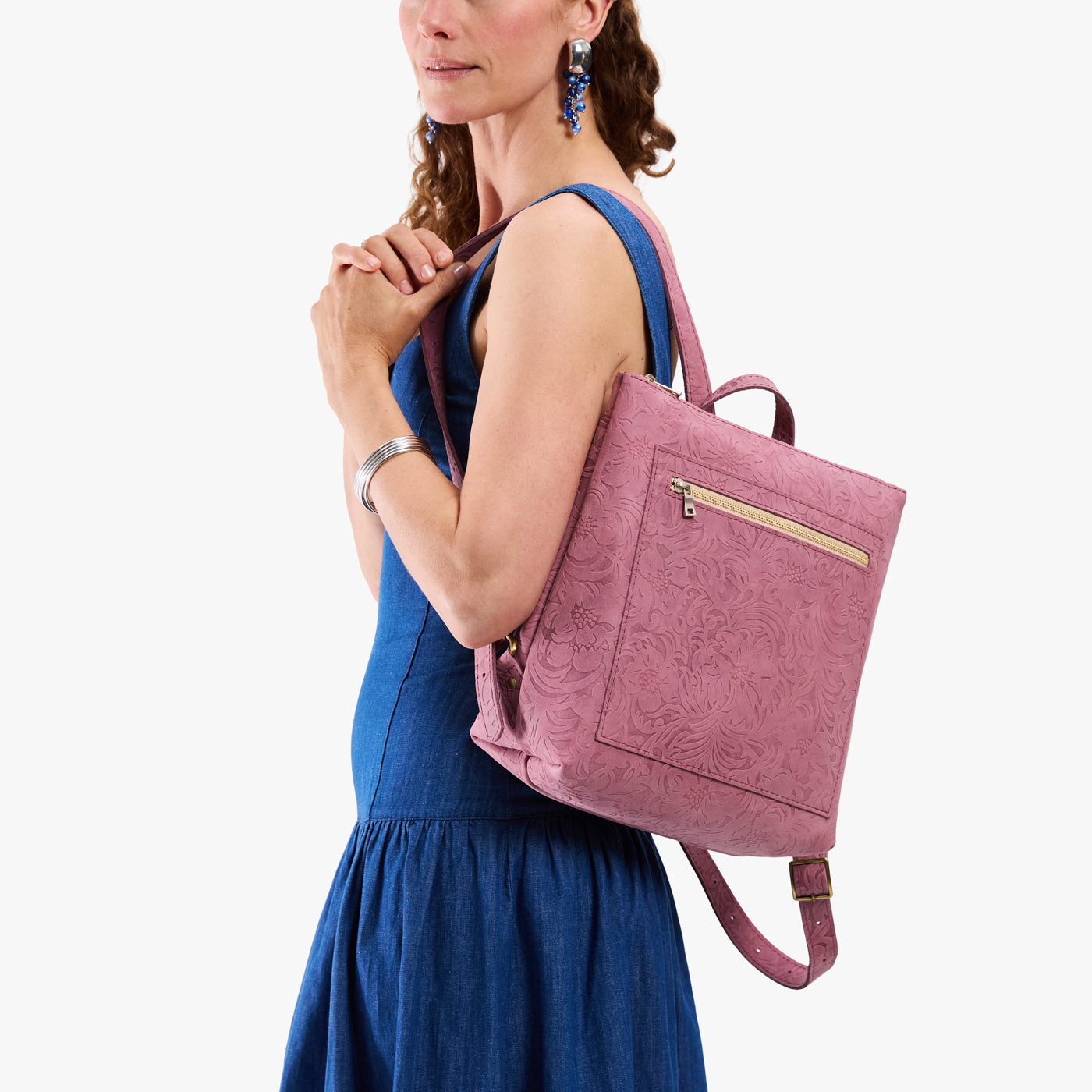 Hollyhock | Model wearing square slim leather tote backpack