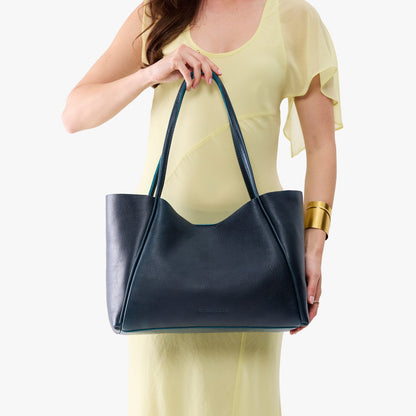 Boreal*Large | Model holding large rectangular tote bag