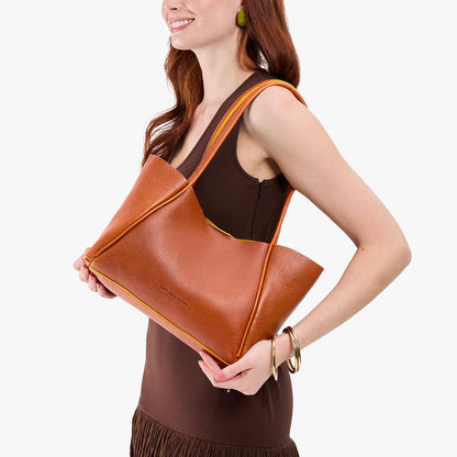 Sienna*Medium | Model holding midsize rectangular tote bag