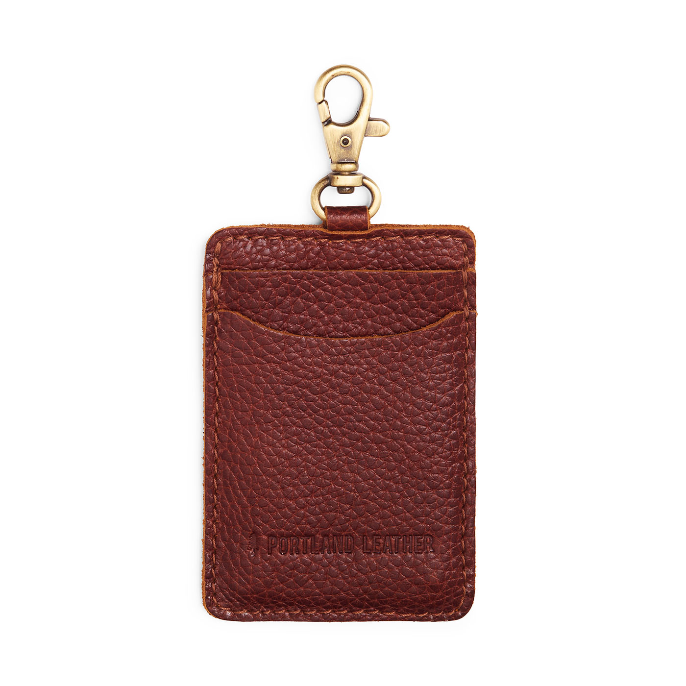 Nutmeg | A leather card holder with a swivel lobster clasp on a white background
