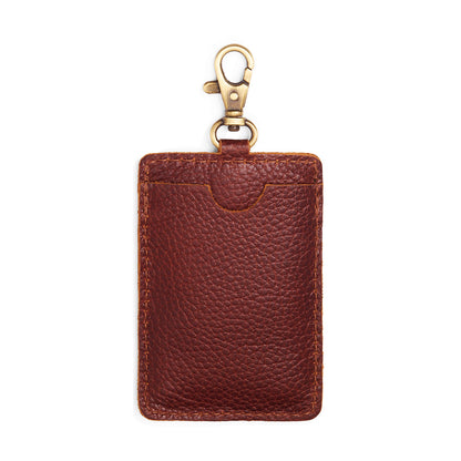 Nutmeg | A leather card holder with a swivel lobster clasp on a white background
